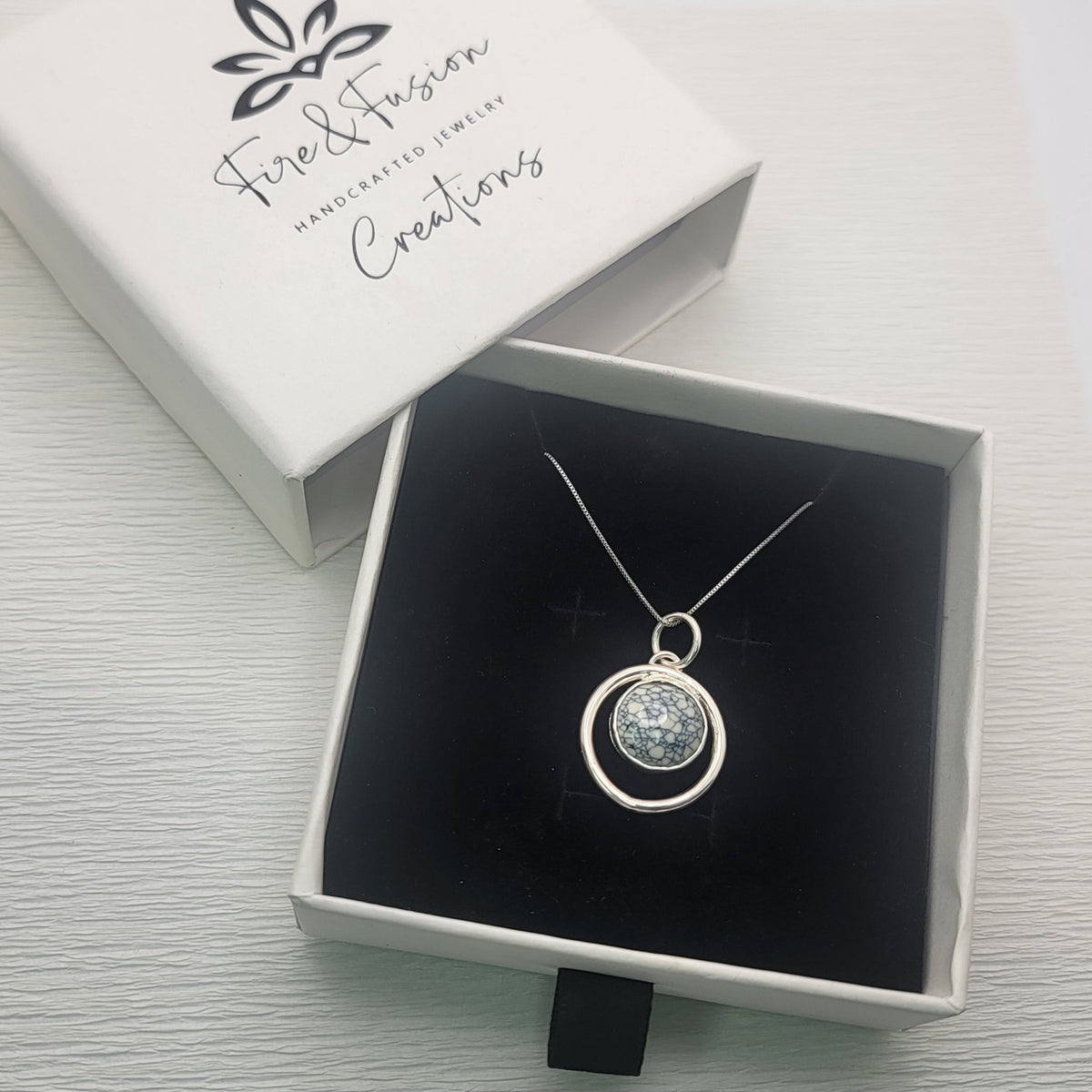 Variscite sterling silver necklace presented in a branded Fire & Fusion Creations gift box.