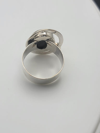 The underside view of the Labradorite Ring 925 Sterling Silver Statement Ring, demonstrating the intricate craftsmanship and the stunning labradorite stone. A stunning option for casual jewelry lovers, this ring serves as a perfect Gift for Her or Gift for Him, ideal as a statement ring in sterling silver.