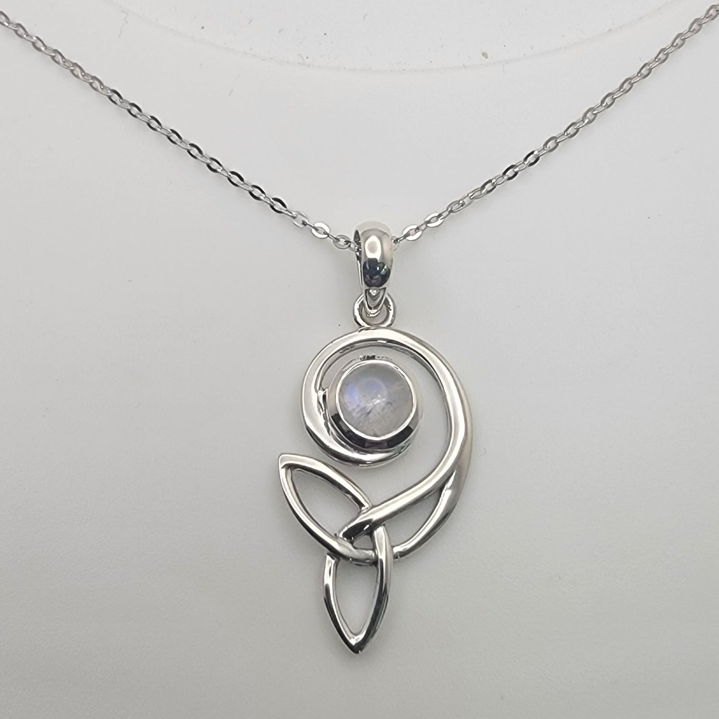 Celtic Swirl Sterling Silver Moonstone Necklace featuring a glowing moonstone set in a swirl design, perfect for intuition and balance.
