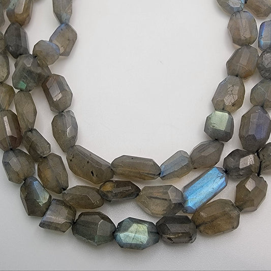 Labradorite Nugget Bead Strands on White Background