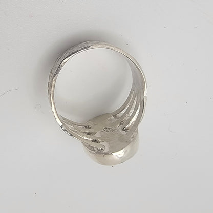 Silver ring on a white background