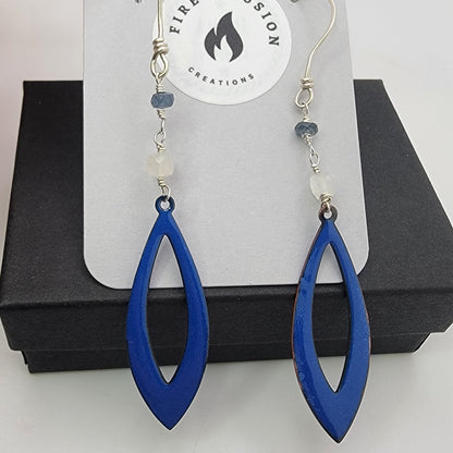 Blue teardrop earrings on a display card with 'Fire and Passion Creations' branding.