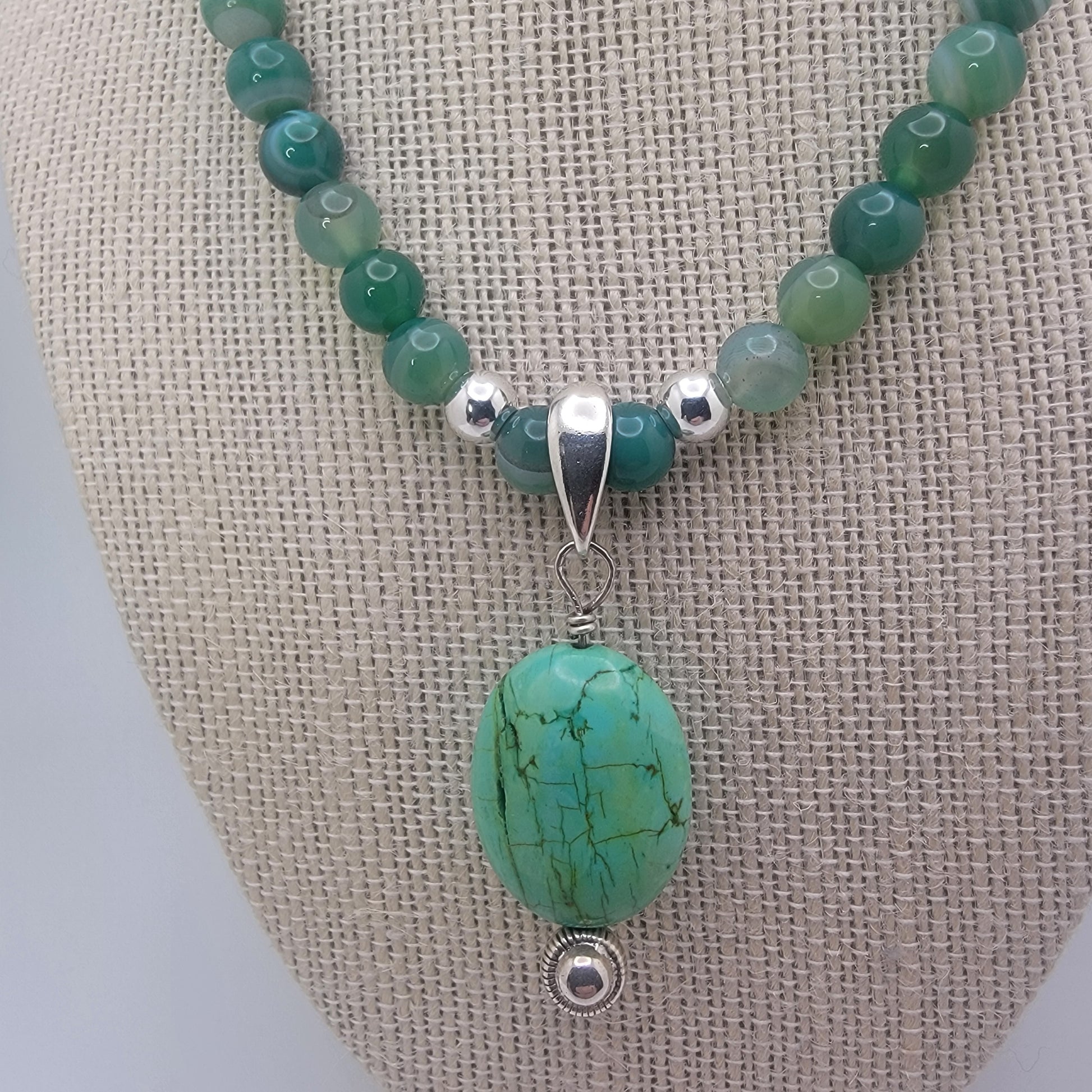 Green agate beaded necklace with removable turquoise focal pendant on sterling silver enhancer bail.